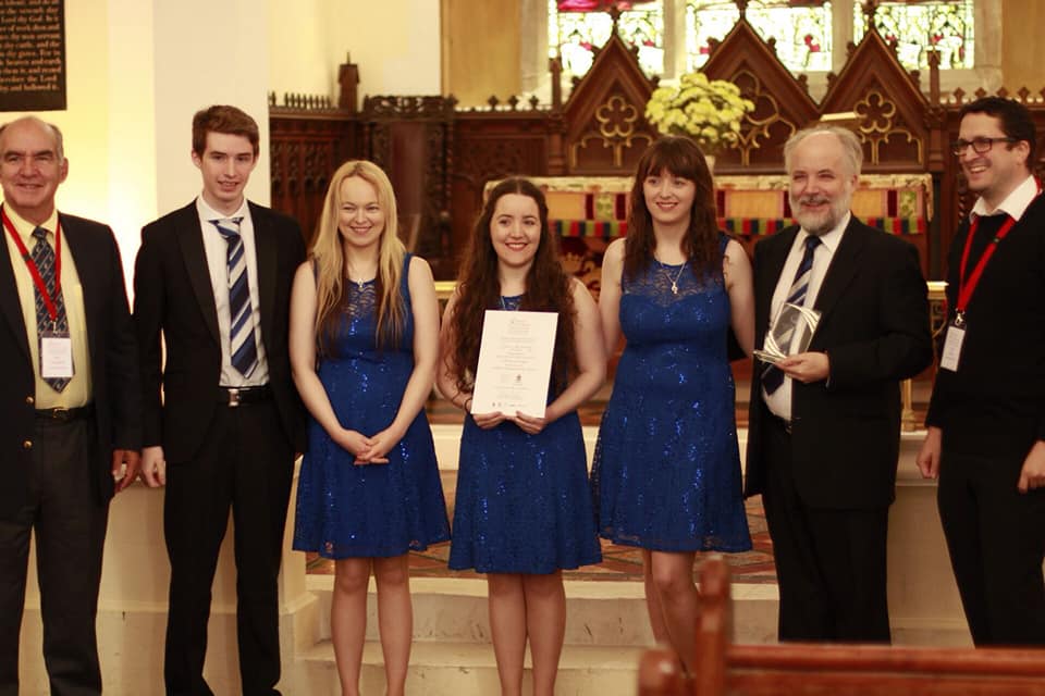 Classic Harmony receiving their prize winning smaller groups category at Mayo International Choral Festival 2018.jpg
